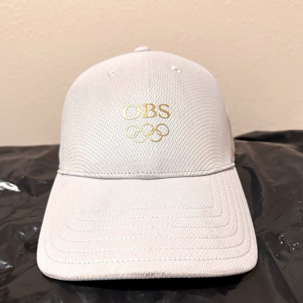 Helly Hansen OBS Tokyo Olympics 2020 Hat Cap. White Cap with Gold Logo